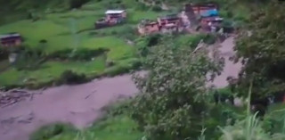 बाजुरामा बाढीले दुई घर बगायो